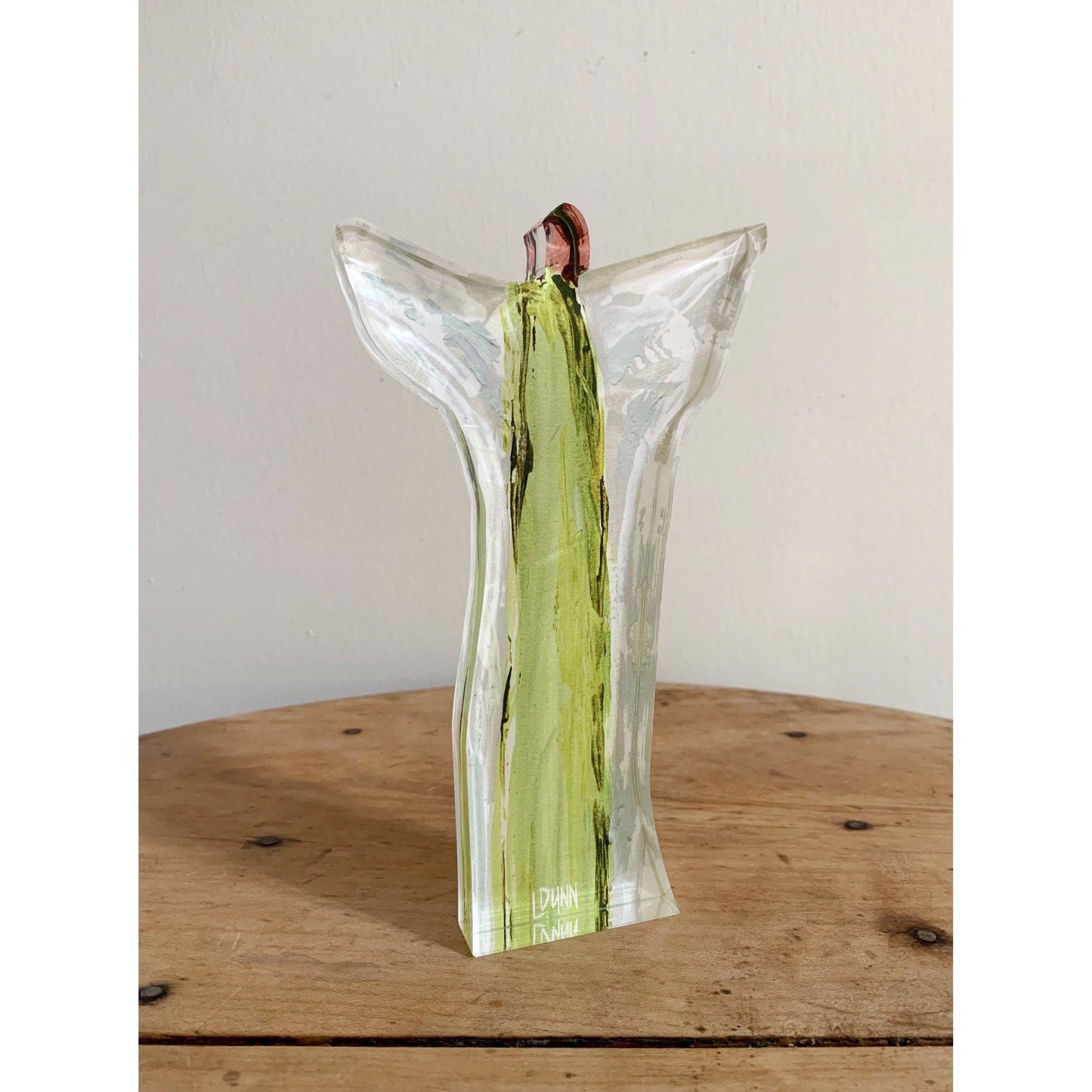 tall green acrylic angel with wings