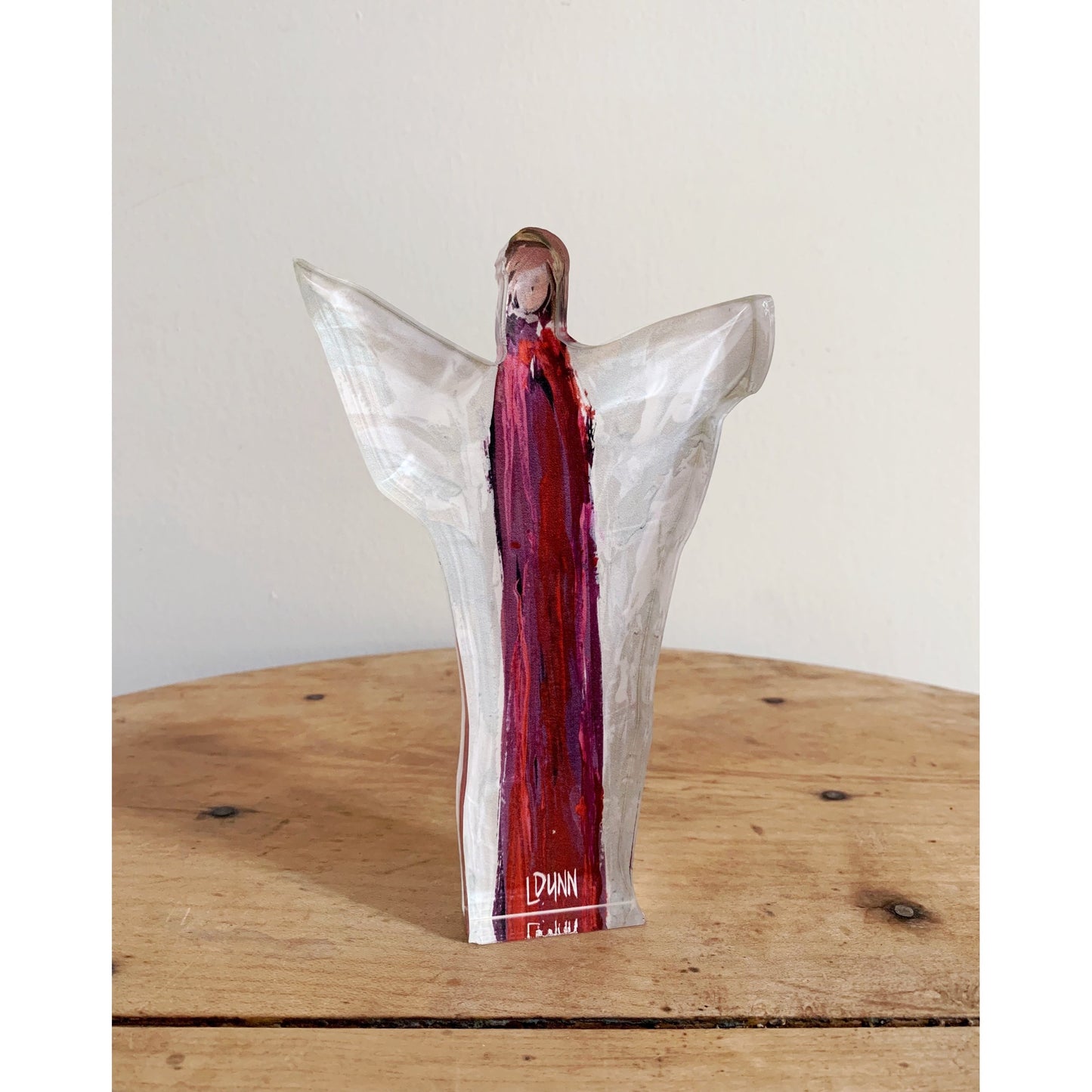 tall red acrylic angel with wings
